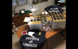 Guardia di Finanza, bottiglie, alcol puro, contrabbando